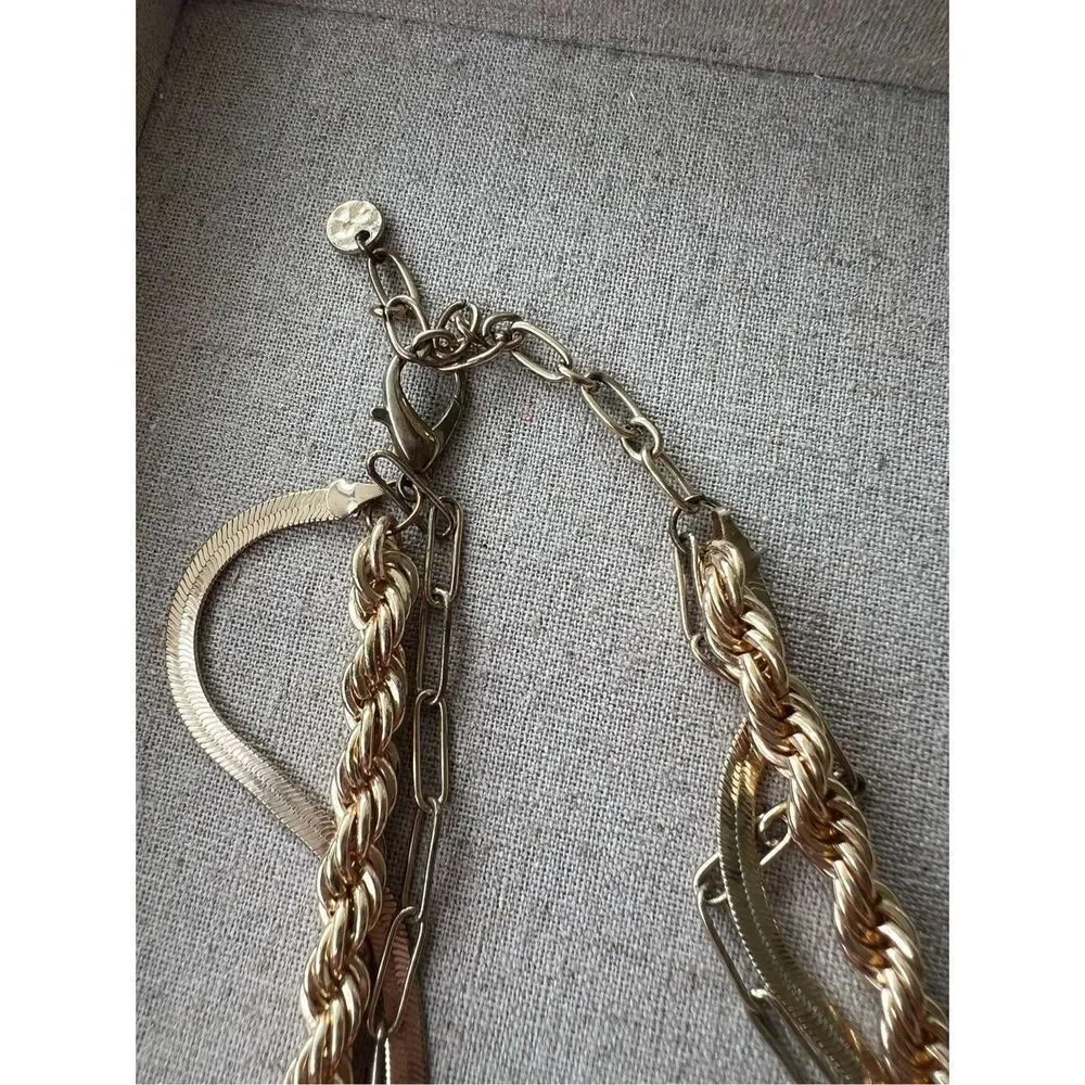 Chunky Gold necklace layered look